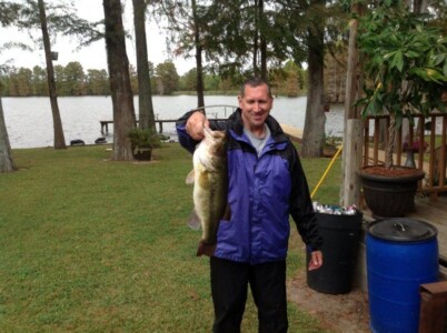 Man at Lakeview Lodge with bass fish