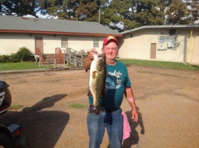 Man and caught fish at Lakeview Lodge